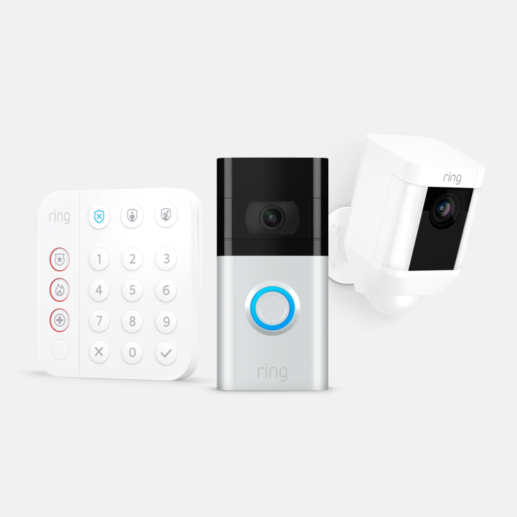 Ring security products, including keypad, video doorbell, and spotlight camera, displayed on a light grey background.