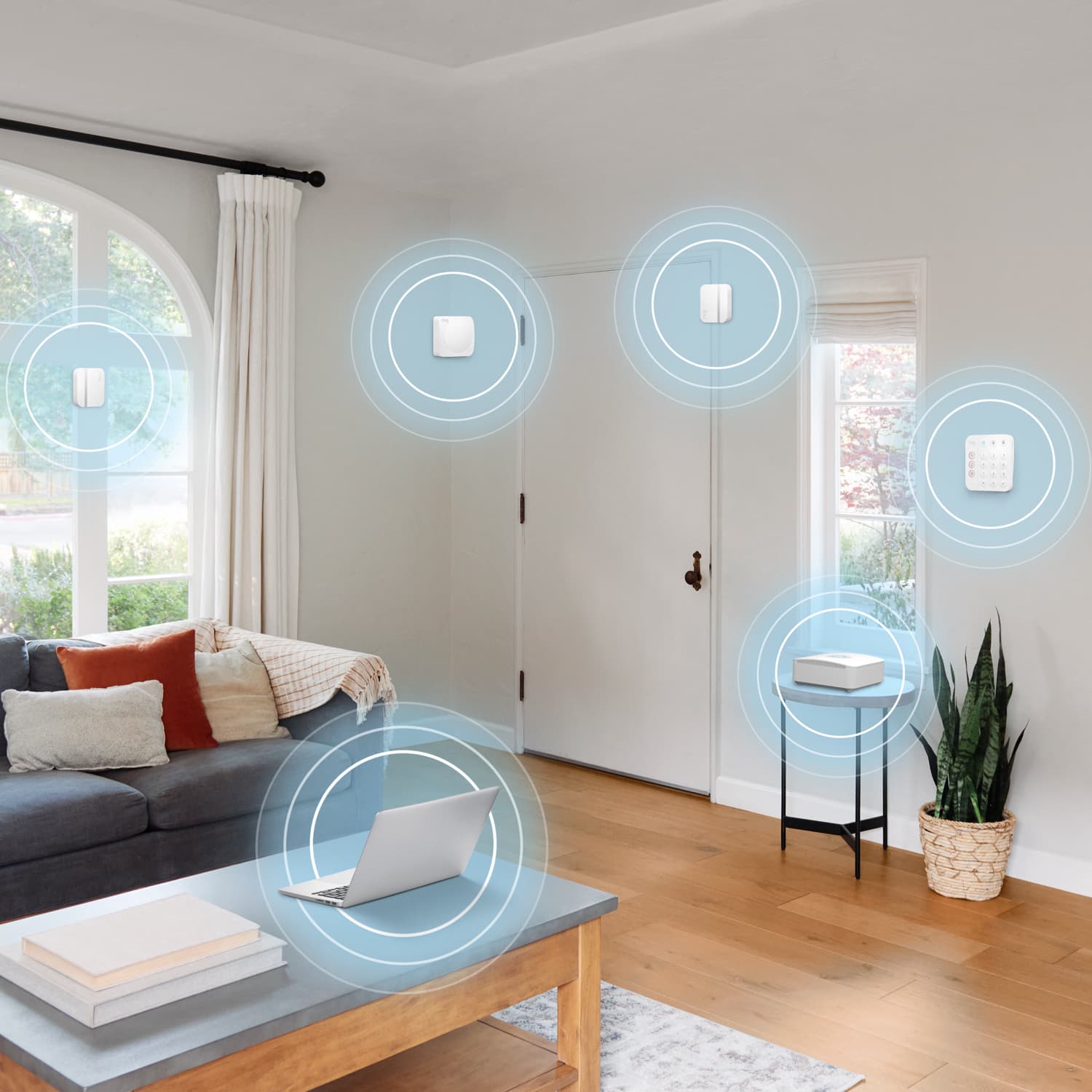 Alarm Security Kit, 10-Piece (for 2nd Generation) - Modern living room with Ring Alarm Security Kit devices highlighted, showing connected sensors, keypad, and base station for whole-home security coverage and real-time alerts. 