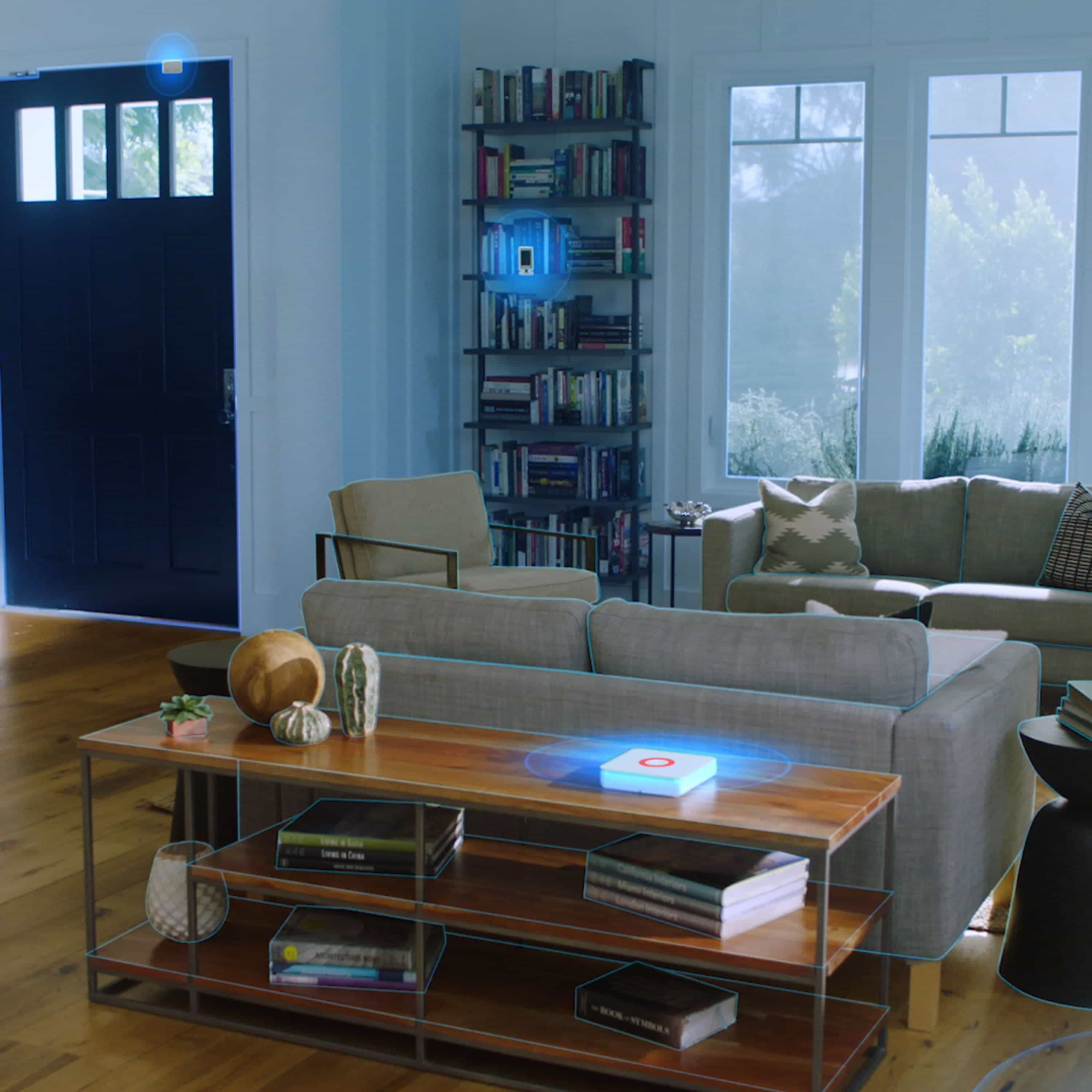 Ring Alarm Outdoor Contact Sensor - Living room with Ring Alarm Security Kit devices highlighted, showing connected sensors, keypad, and base station.