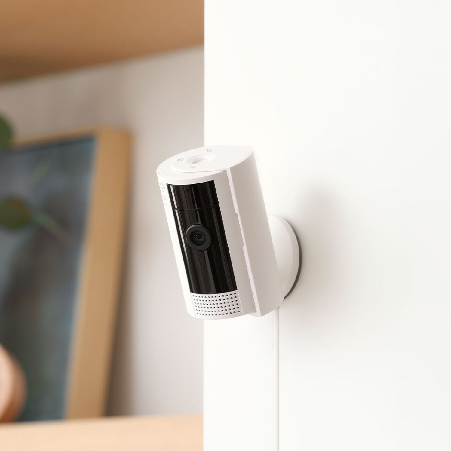 10 ft USB-A to Micro USB Power Cable (Indoor Cam (2nd Gen)) - White Ring Indoor Cam 2nd Gen mounted on a wall, powered by a white 10-foot USB-A to Micro USB Power Cable.