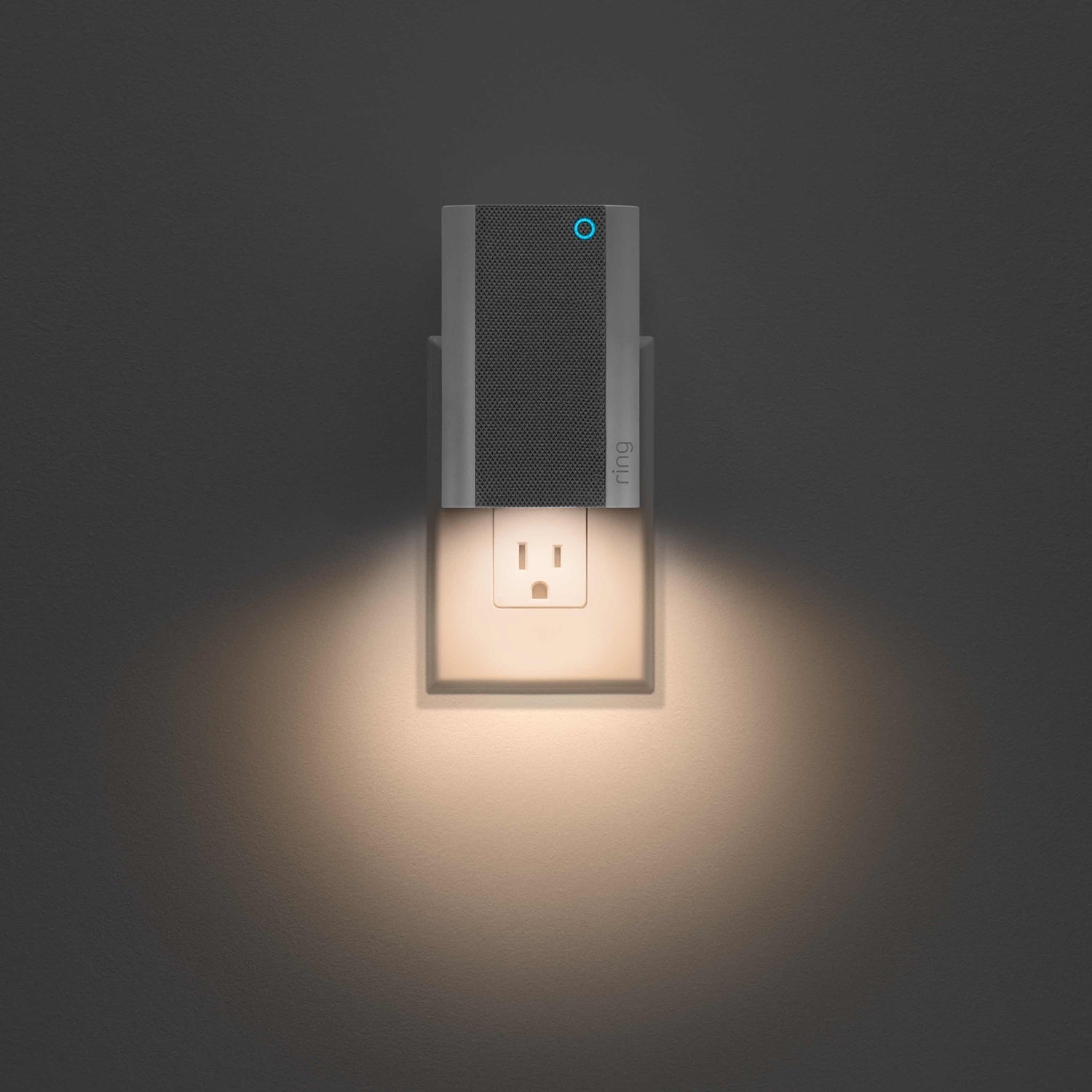 Chime Pro (Certified Refurbished) - Ring Chime Pro plugged into a wall outlet, illuminating the wall below it with built-in automatic nightlight.