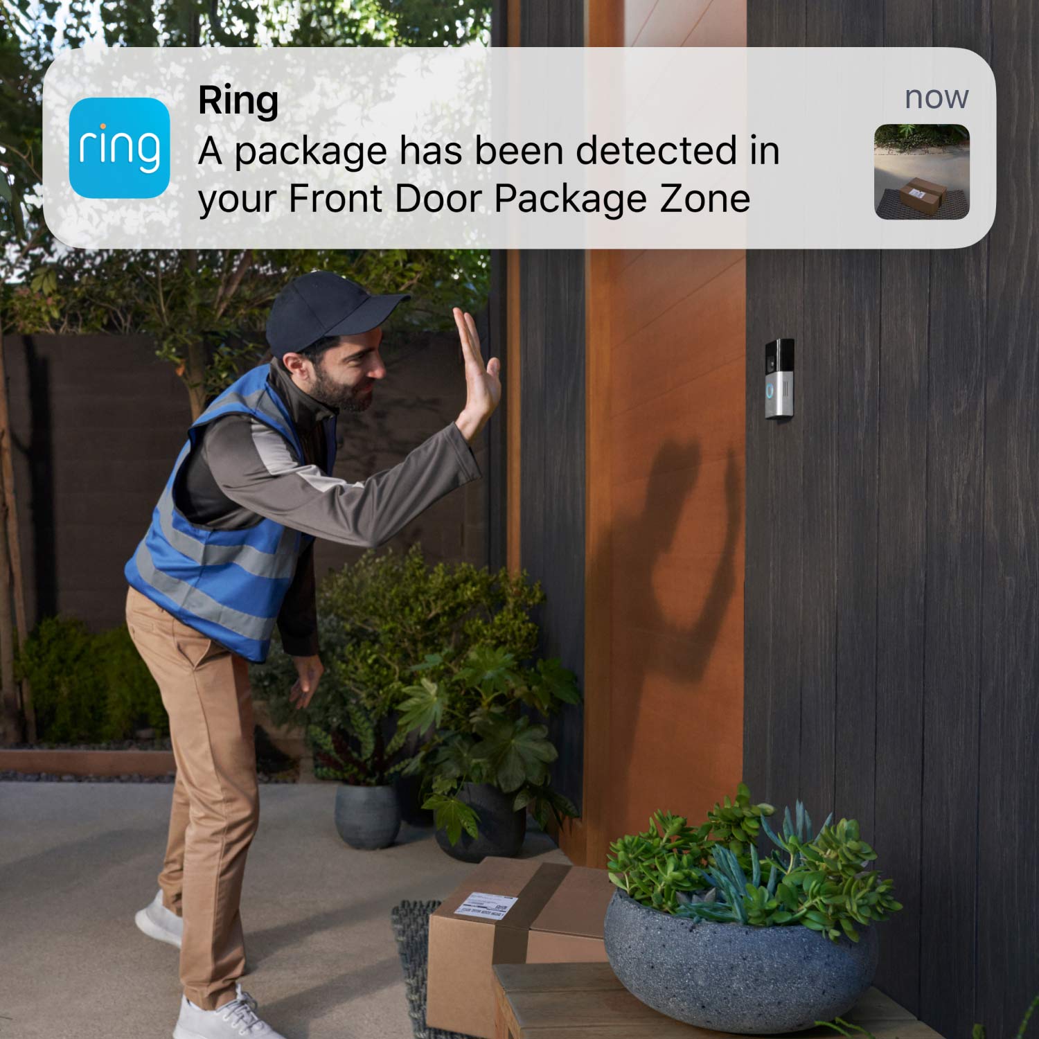 Battery Doorbell Pro - Delivery driver waves after leaving a package, with a Ring App alert showing package detection in Package Zone.