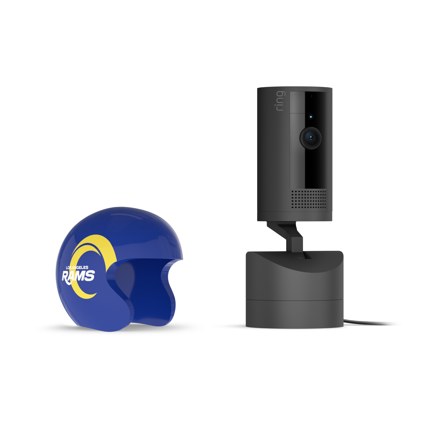 Pan-Tilt Indoor Cam, Black + NFL Game Day Cam Cover — NFC - Black Ring indoor camera on stand next to a blue Los Angeles Rams mini helmet with yellow horn logo, set against a white background.