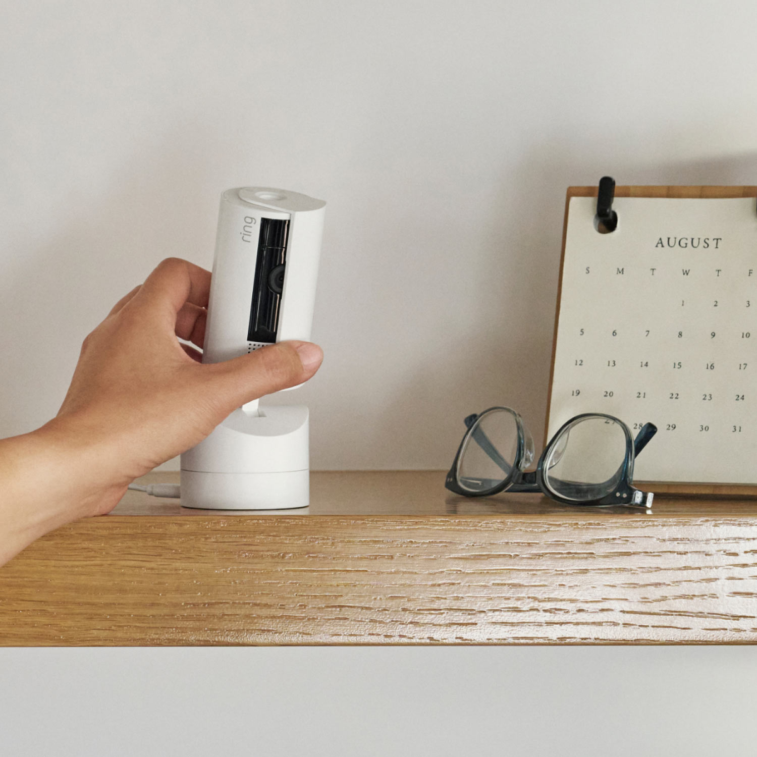 Pan-Tilt Indoor Cam  - Video of White Ring Pan-Tilt Indoor Cam, highlighting its 360-degree functionality and monitoring features.