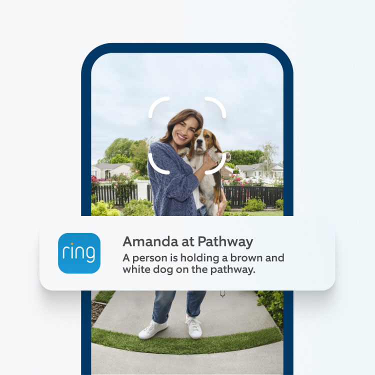 Ring app alert on a phone reads: “Amanda at Pathway. A person holding a brown and white dog on the pathway.”