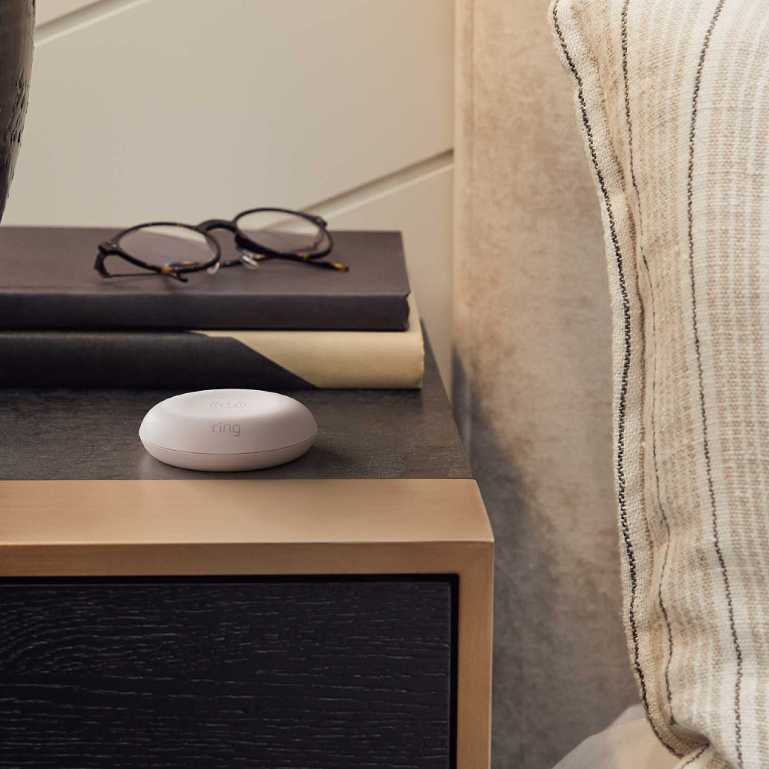 Smart Light Remote - Smart Light Remote  on a bedside table.