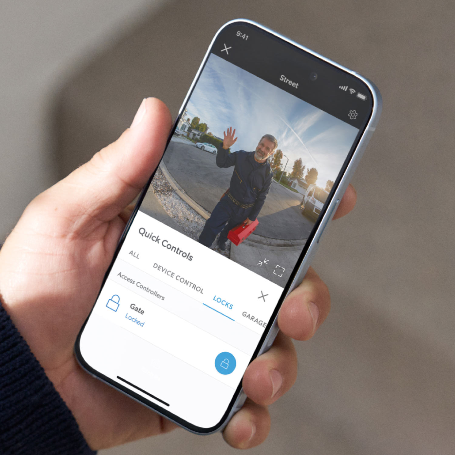 Wired Doorbell Elite (Newest Model) - Person holding phone and using Access Control in Ring app.
