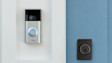Ring Video Doorbell mounted next to black door lock